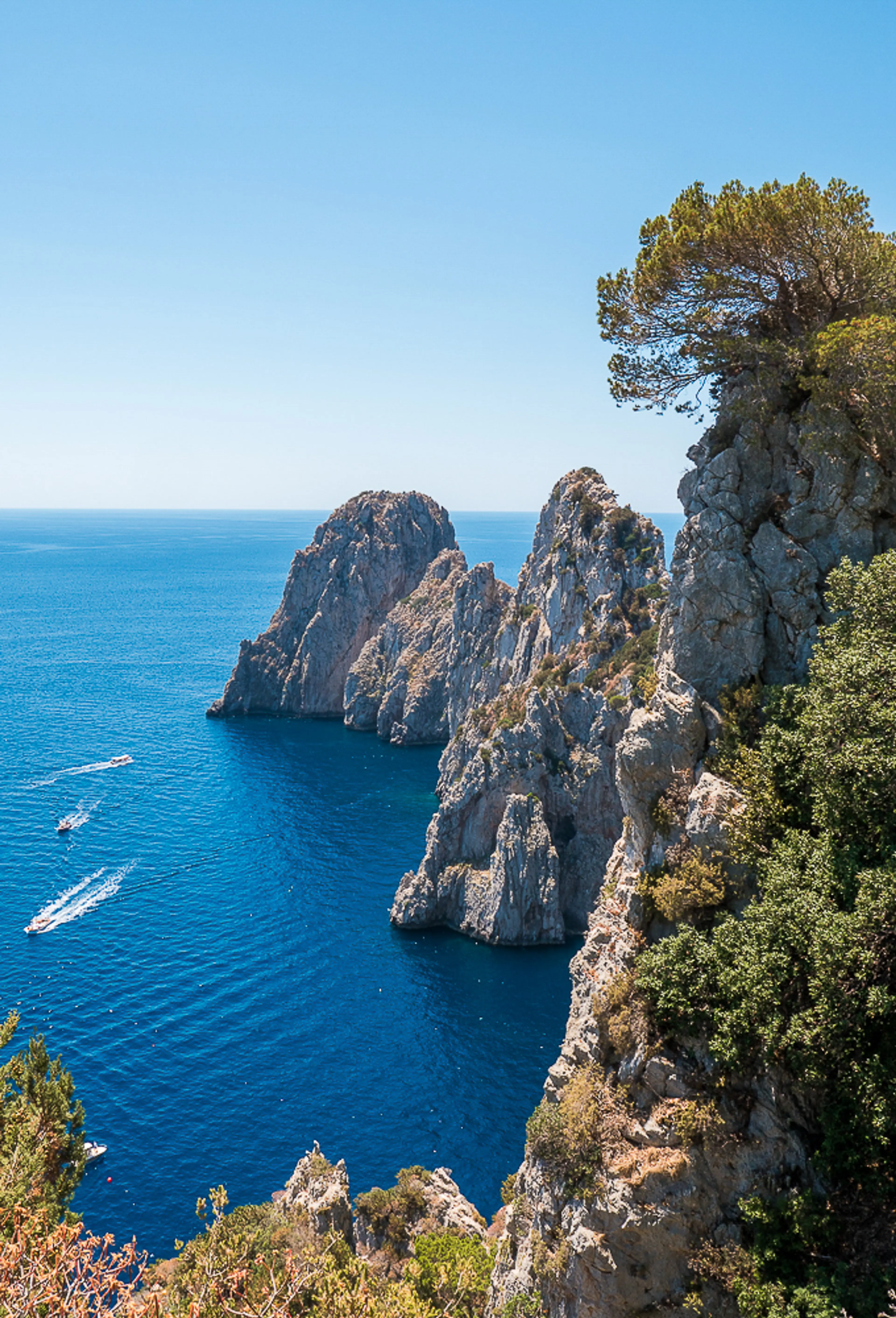 Cliffs and crystal-clear sea in Capri
