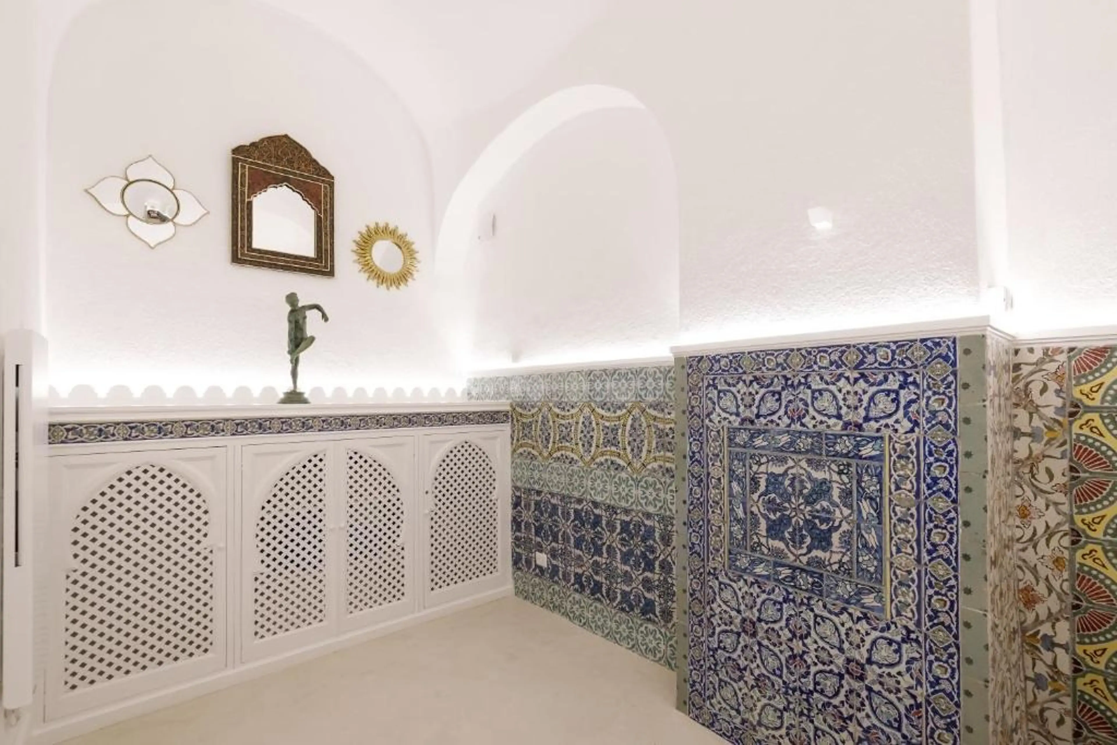 Living area of the Qasar Suite with Moorish-style decor