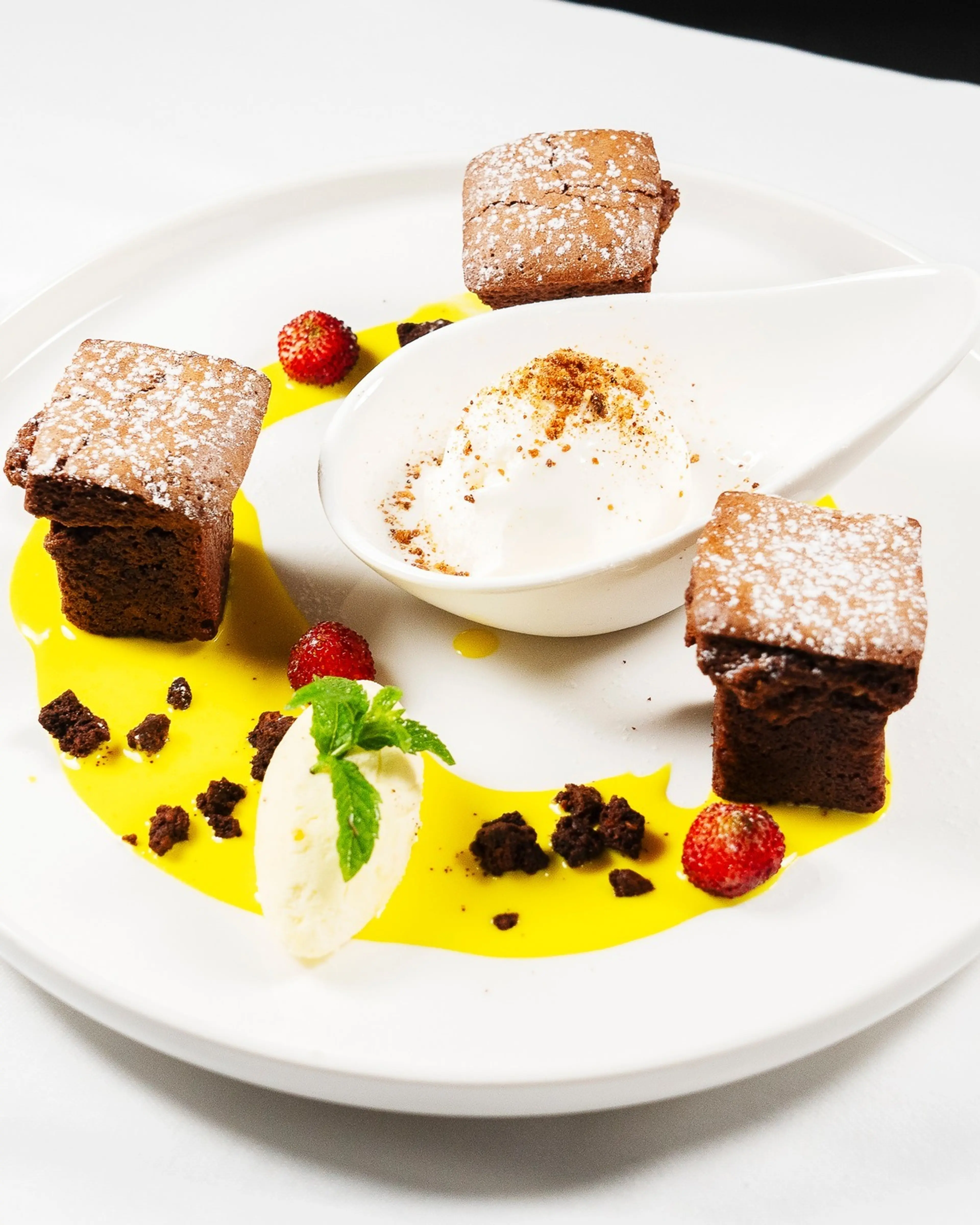 Chocolate fondant with vanilla and wild strawberries