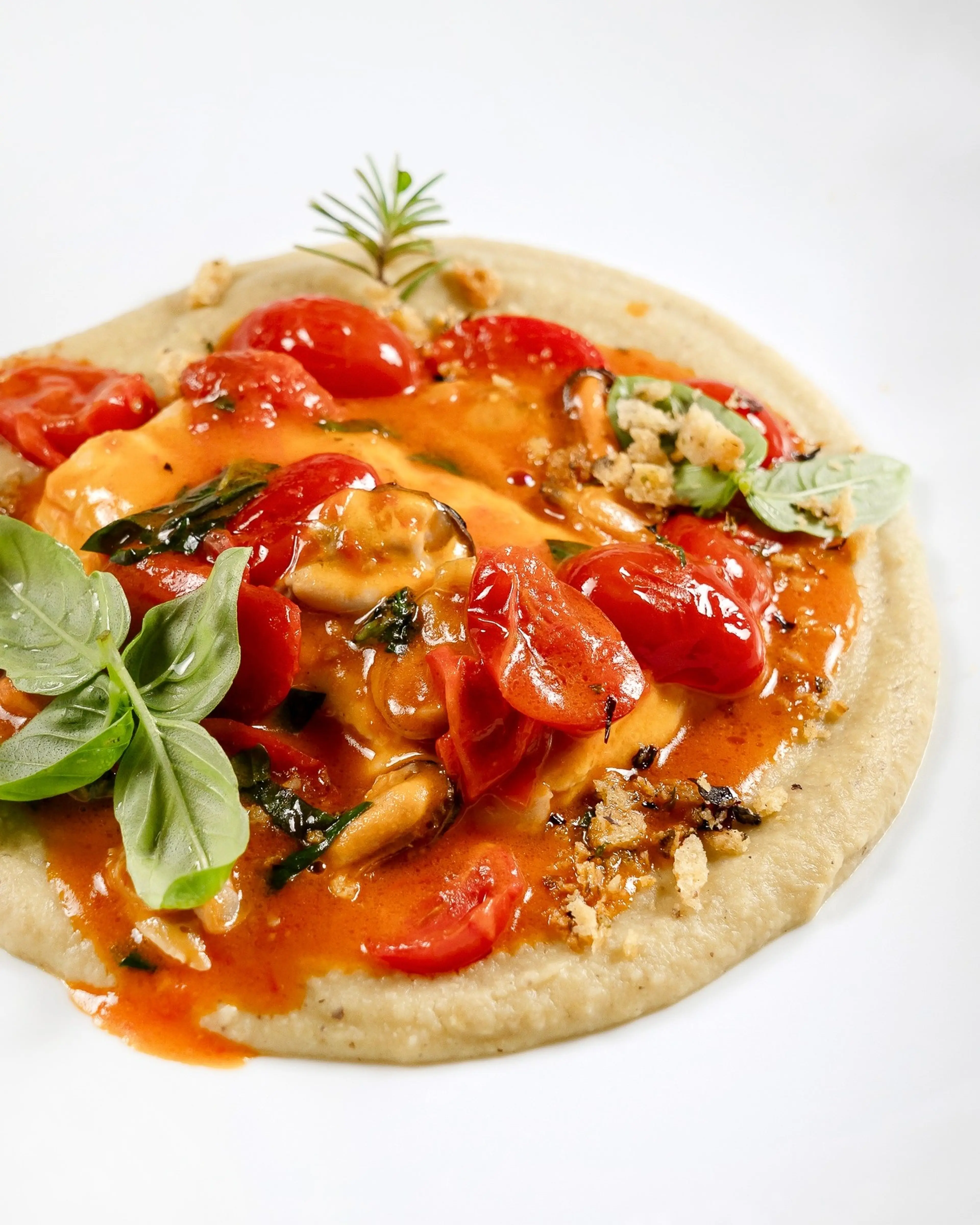 Cannellini bean cream with mussels and cherry tomatoes