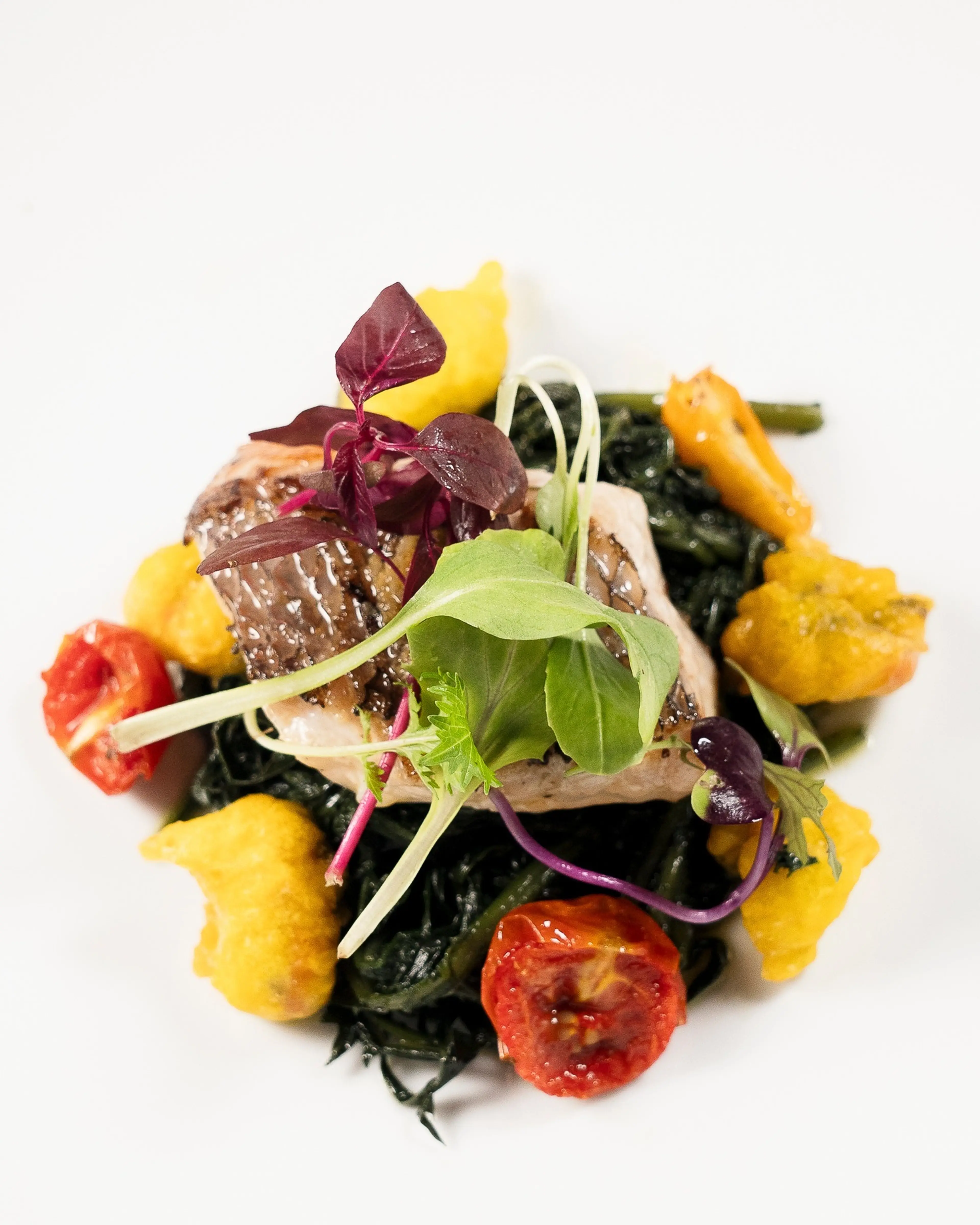 Seared tuna with sautéed greens
